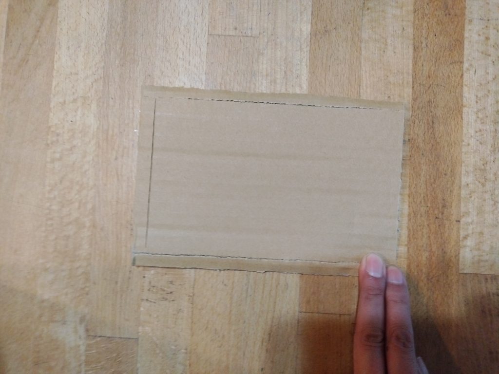 グリルの火が付かいのを解決する段ボールをつぶす